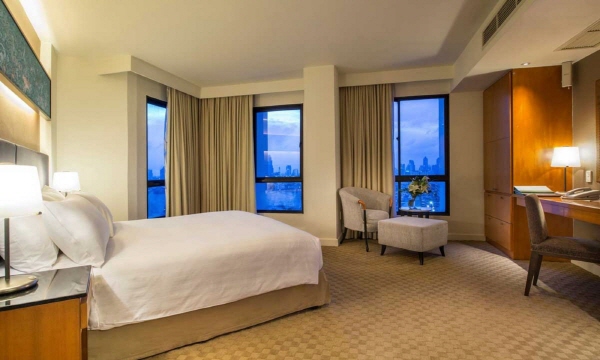 1441612682_sGrand_Deluxe_Three_-_Bedroom_Suite_1_optimize.jpg