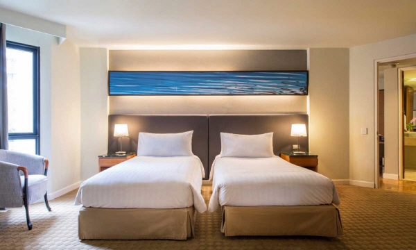 1441612695_sGrand_Deluxe_Two_-_Bedroom_Suite_3_optimize.jpg